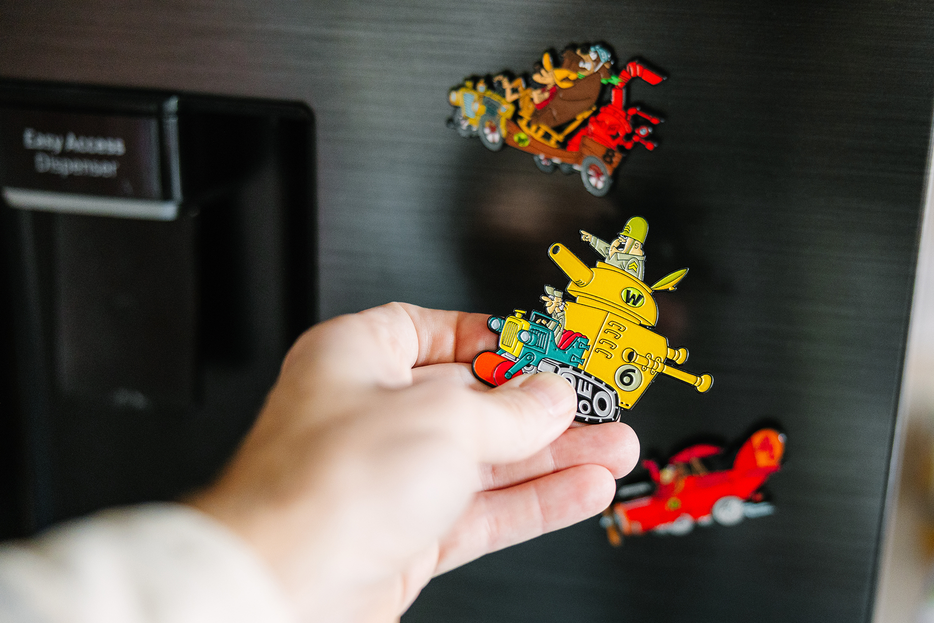 Blu Goblin Wacky Races pin badge held in hand cropped view