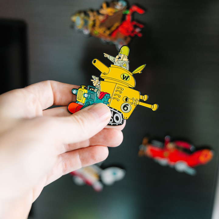 Blu Goblin Wacky Races pin badge held in hand