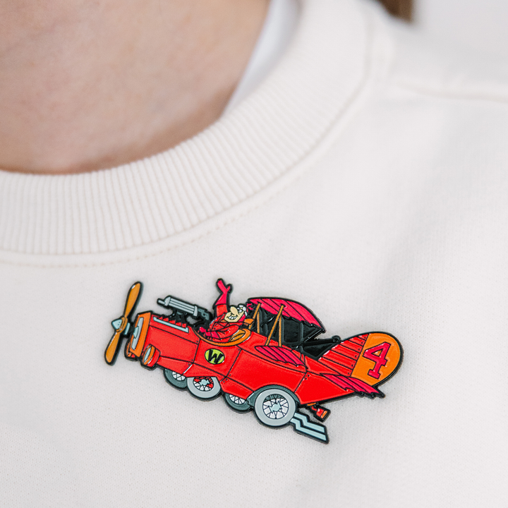 Blu Goblin Wacky Races pin badge worn on t-shirt