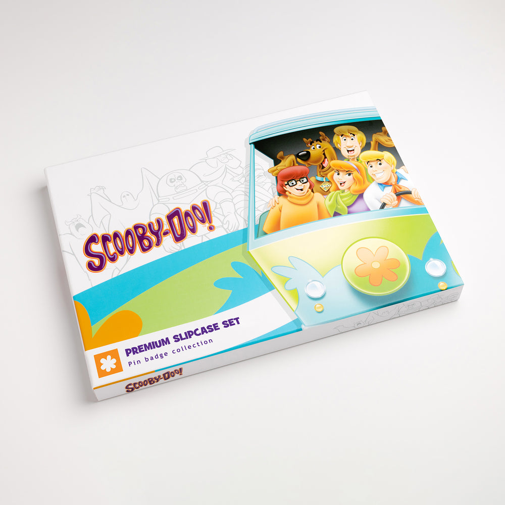 Scooby-Doo pin badge box set closed showing front slipcase artwork with the Scooby gang in the Mystery Machine illustration