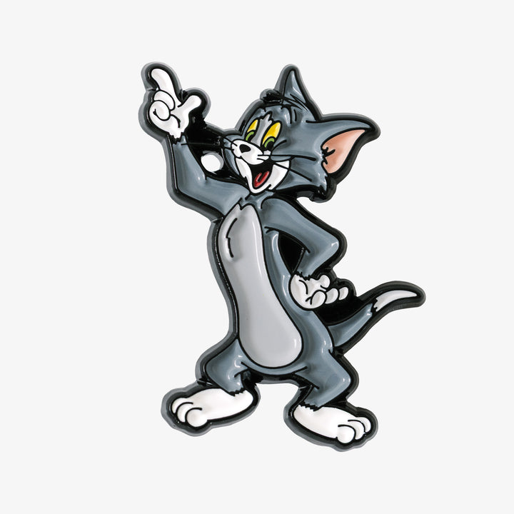 Tom looking happy and smiling
